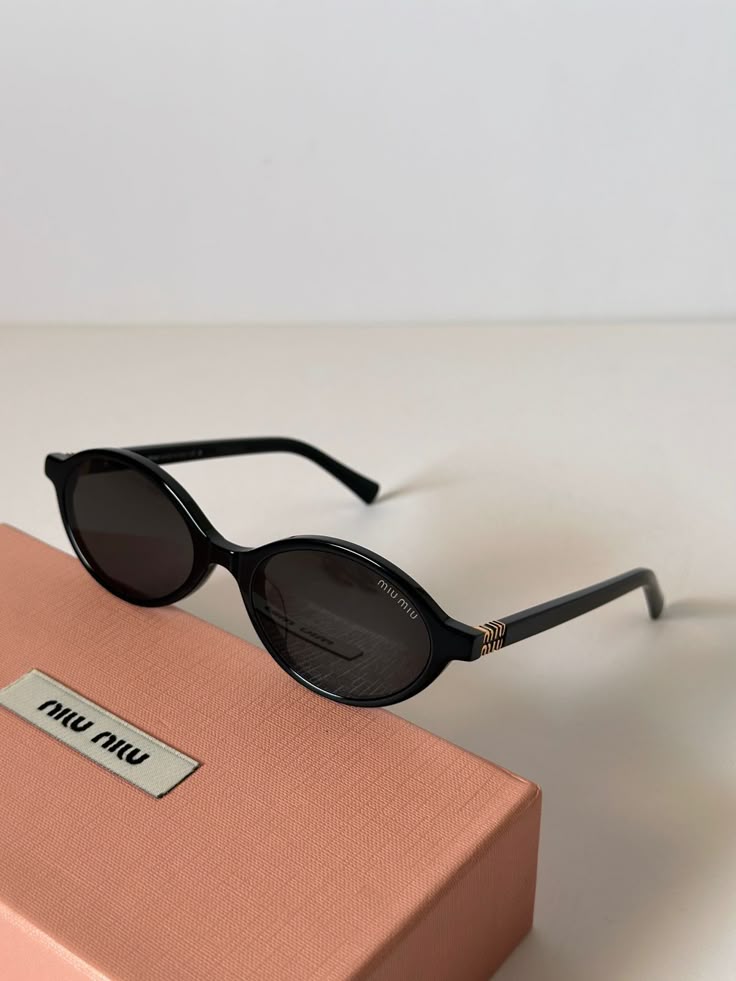 Miu Miu Oval Shape Black Gold